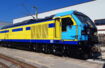 Illustration of a locomotive in blue and yellow.