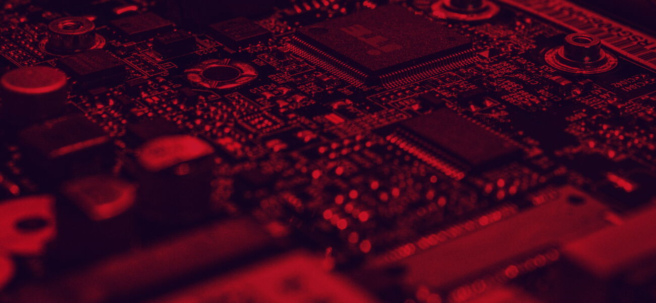 Reddish image - detailed image of a circuit board.